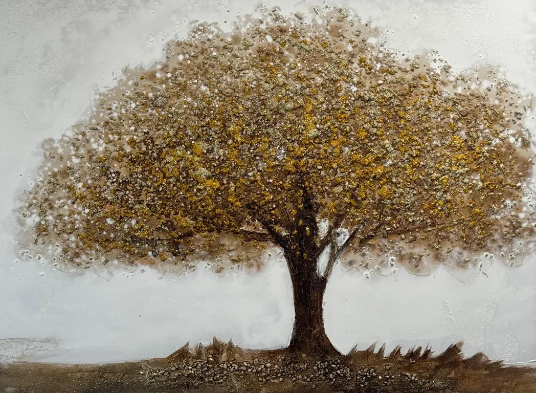 Tableau d'un arbre dans des tons dorés et terre, en relief de pierre et de feuille métallique